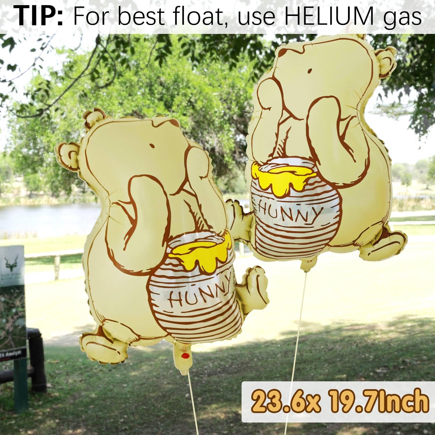 Winnie foil balloons included with the kit paired with heart foils for celebration