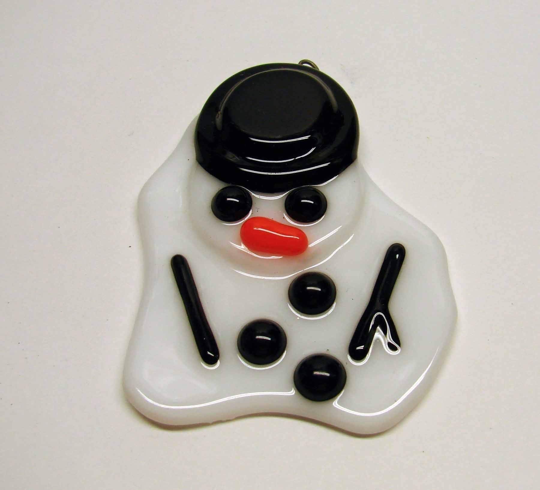 Hand-cut glass pieces form melted snowman ornament 3x2.25 inches