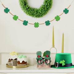 Seven shamrocks about 3 inches wide and 48 wood beads on 60 inch rope