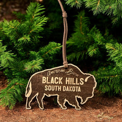 Bison ornament cut from solid cherry wood with natural back finish
