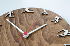 Wood clock with skiers on each number