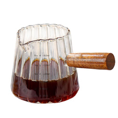 Wooden handle espresso measuring cup with dual scale display