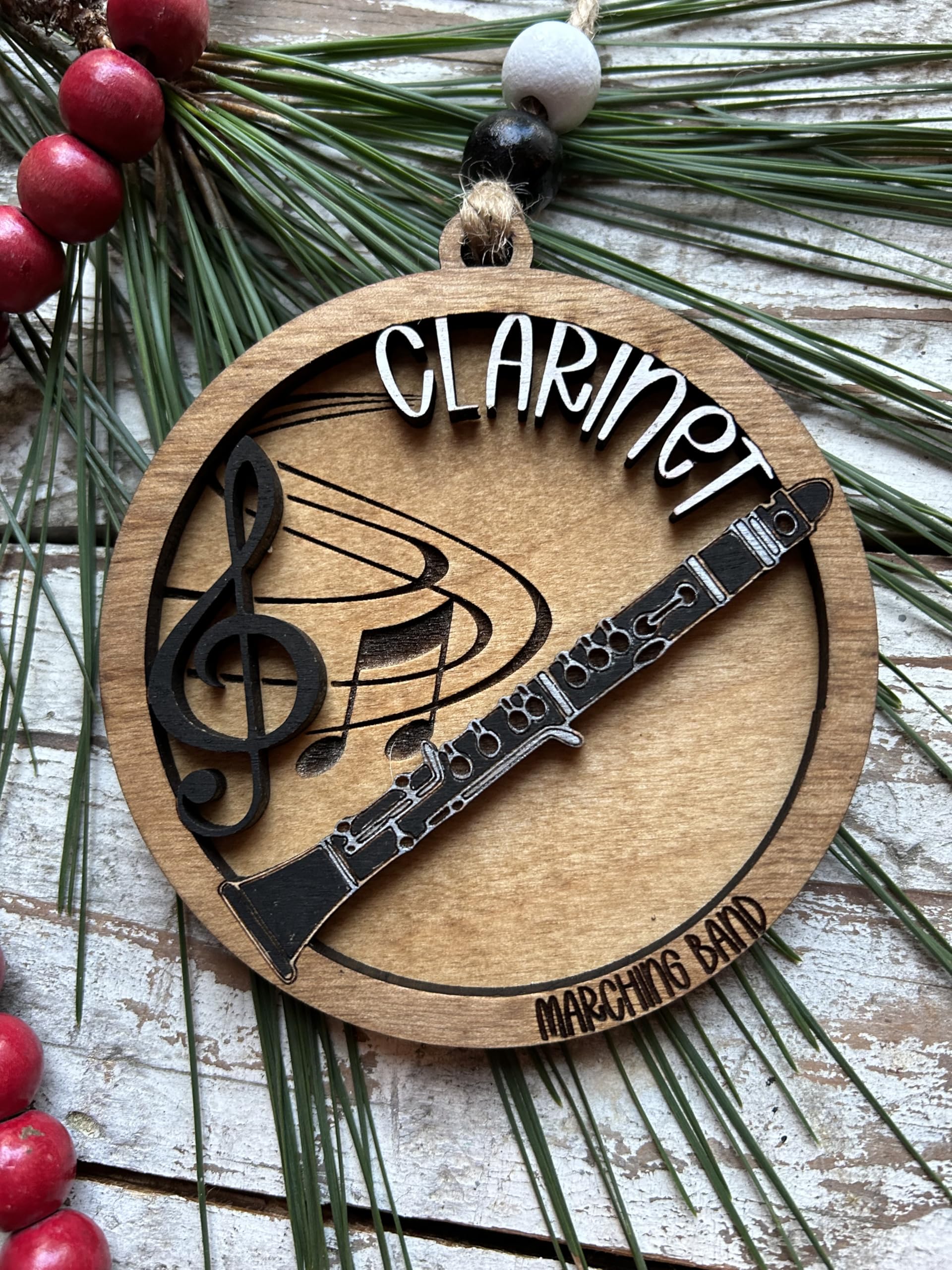 Handpainted wood ornament made in North Carolina USA by a husband and wife team