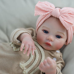 Lifelike reborn baby girl doll with poseable vinyl limbs