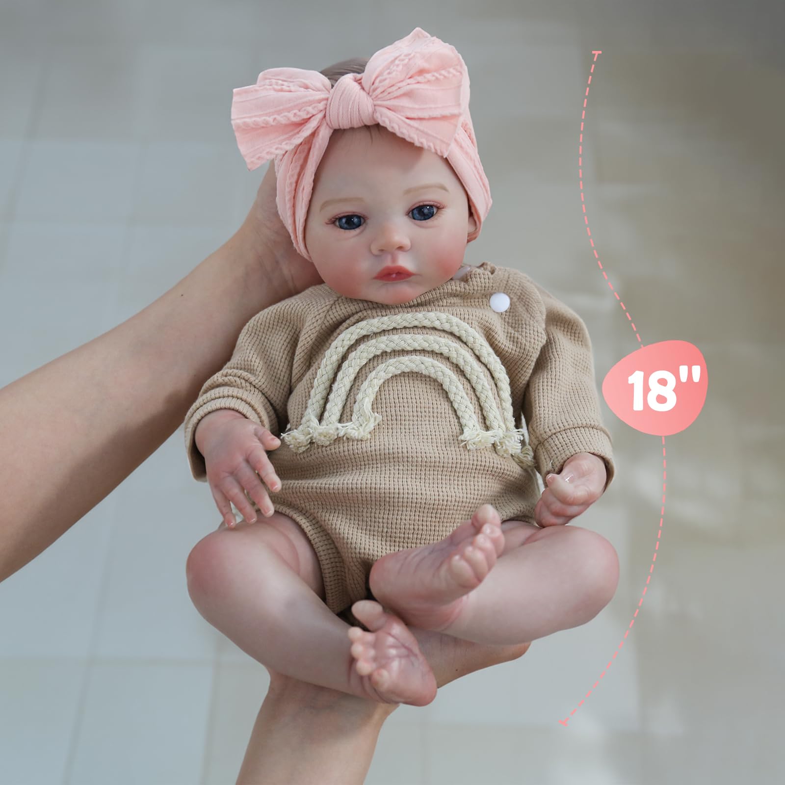 Hand-painted skin details on reborn baby doll with rosy cheeks