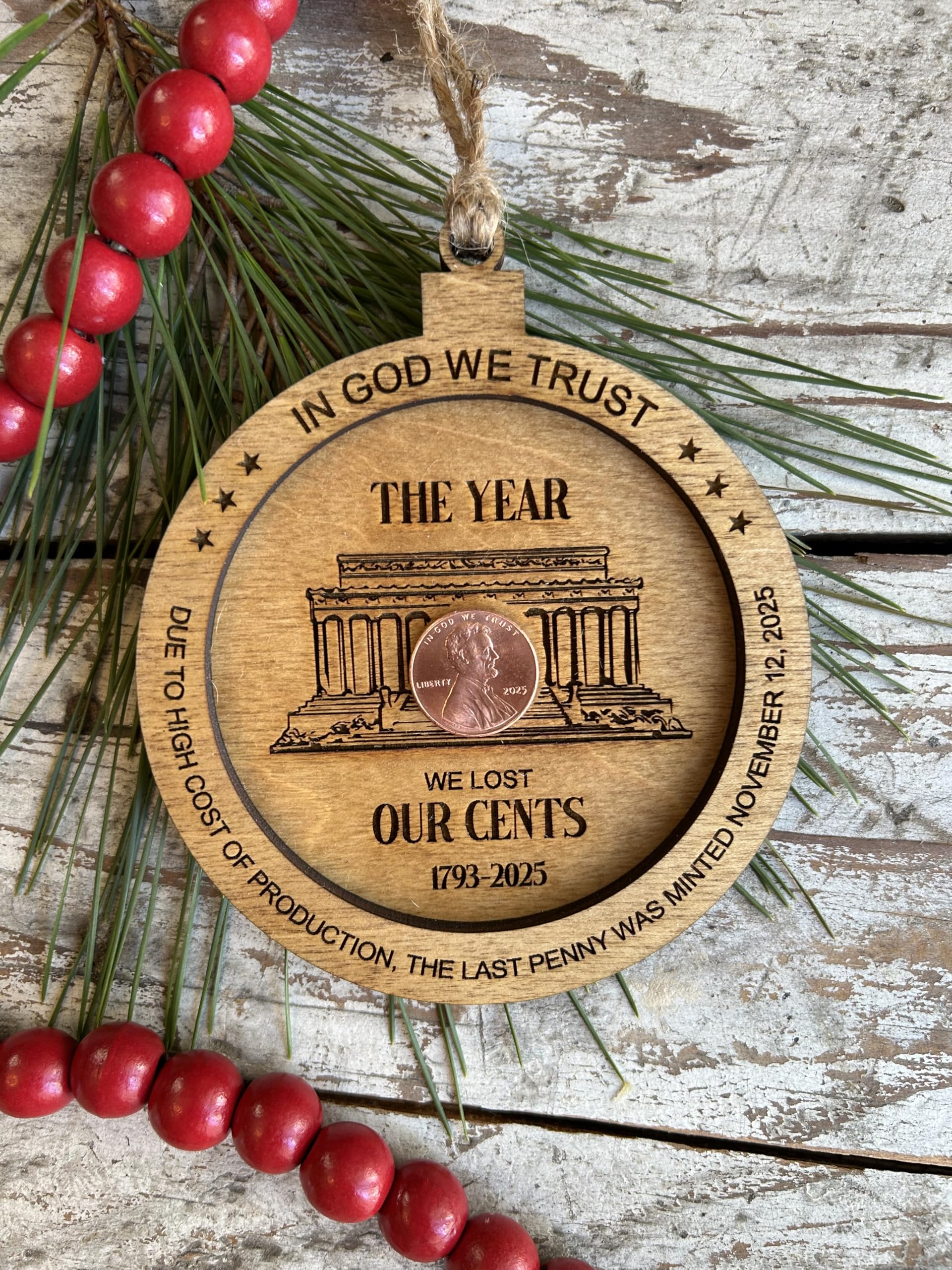 Ornament measures approximately 3.75 inches wide