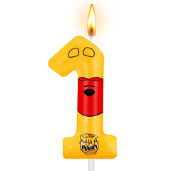 Yellow bear birthday candle on cake for Pooh theme party