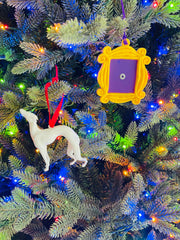 Yellow Peephole Door Frame ornament closeup