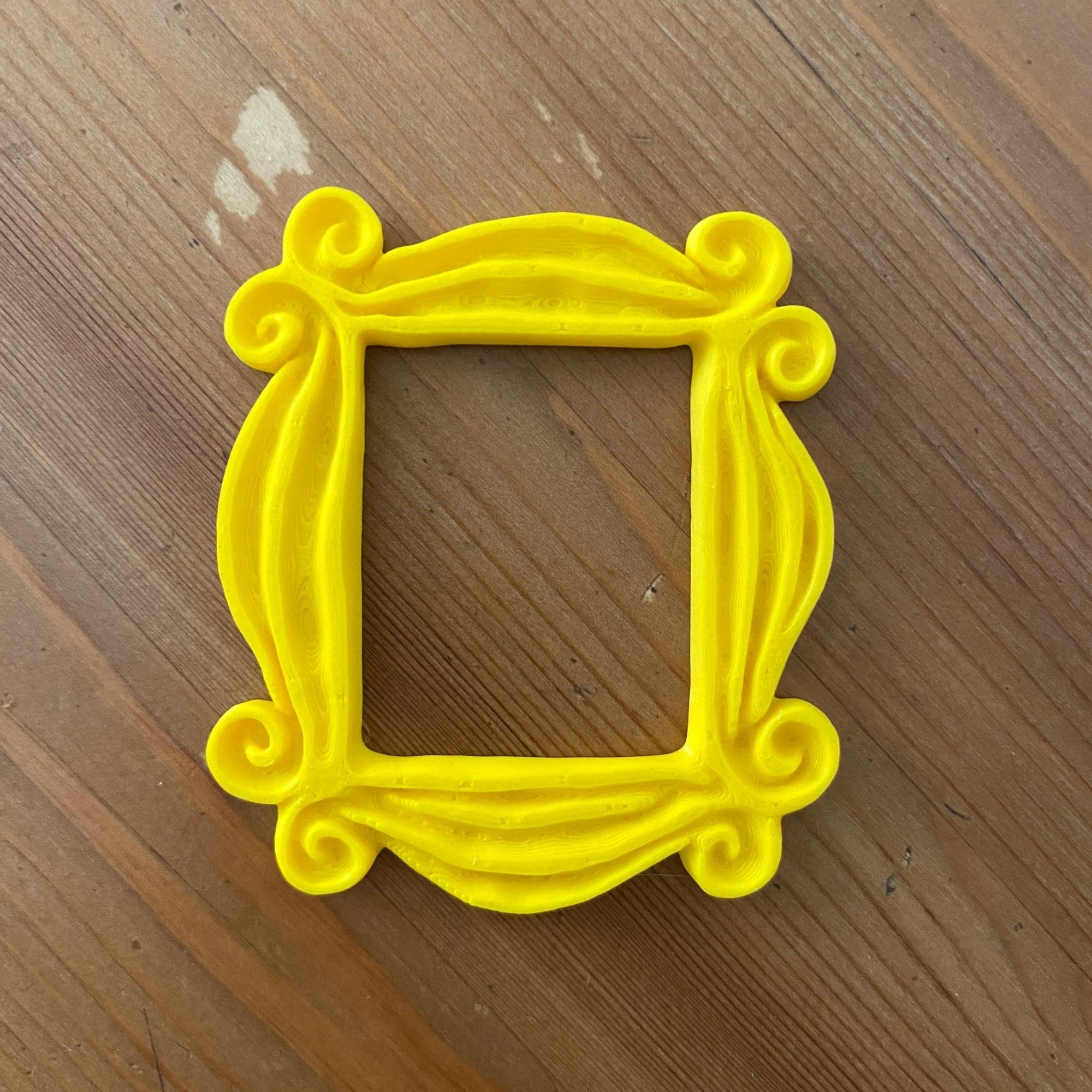 Yellow framed peephole accessory for doors