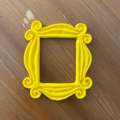 Yellow framed peephole accessory for doors