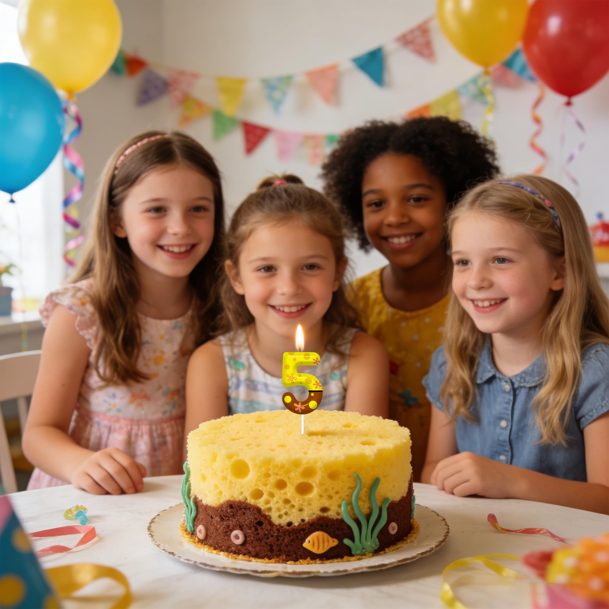 Yellow and pink themed cake candle for birthday celebrations