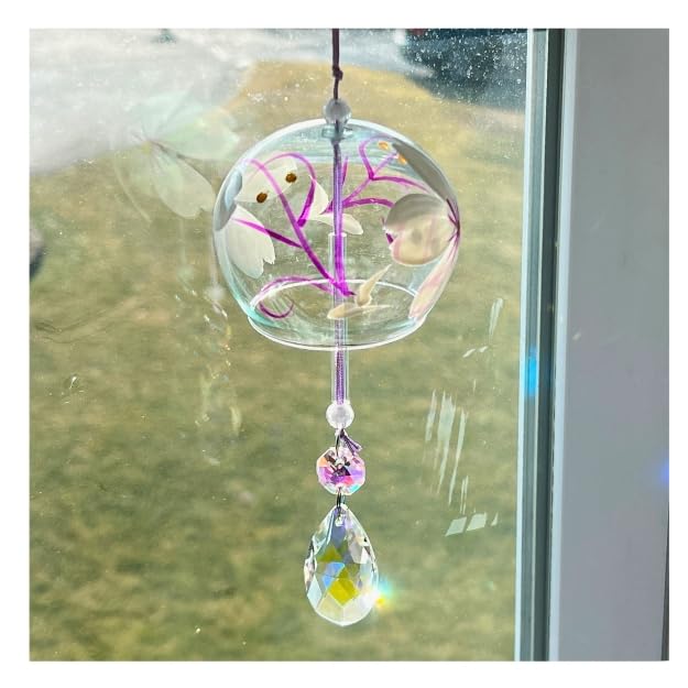 Decorative window ornament measures approximately 12 inches from top to bottom