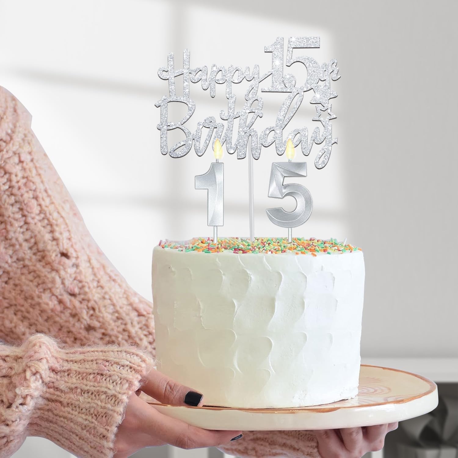 Number 15 candles included in silver set