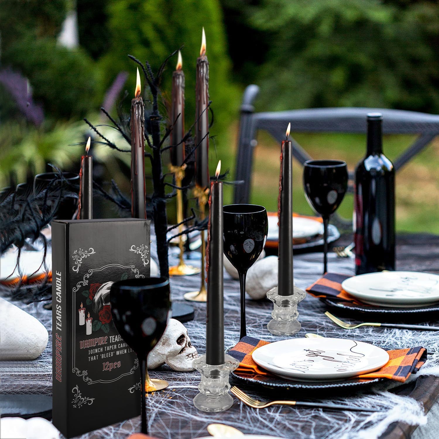 Spiritual black taper candles with dripping wax