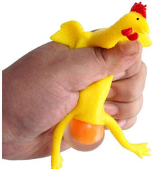 Chicken and eggs squishy toy with egg pop feature