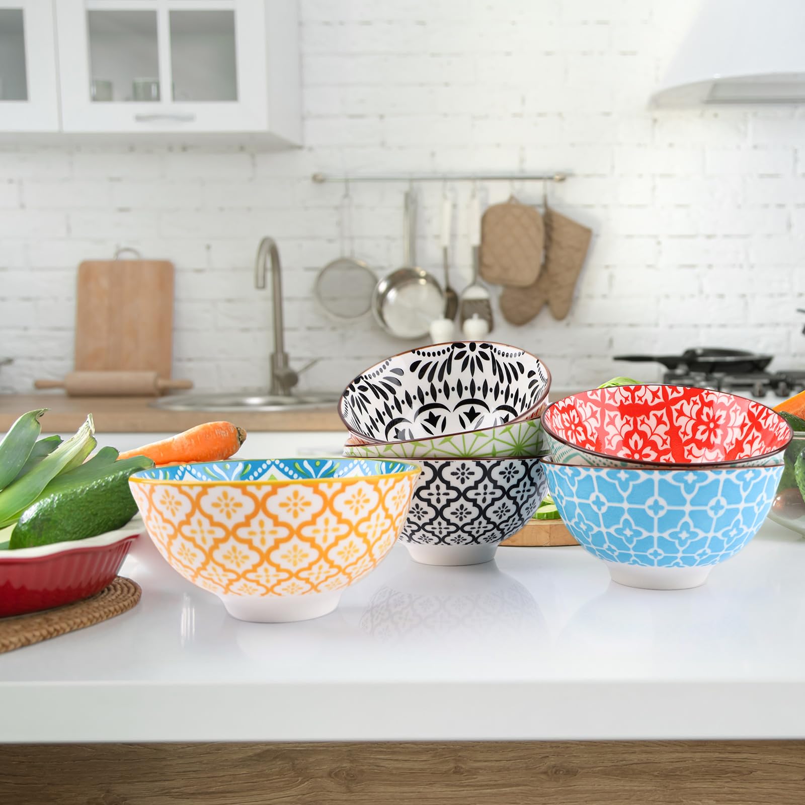Colorful glazed bowls stackable for easy storage