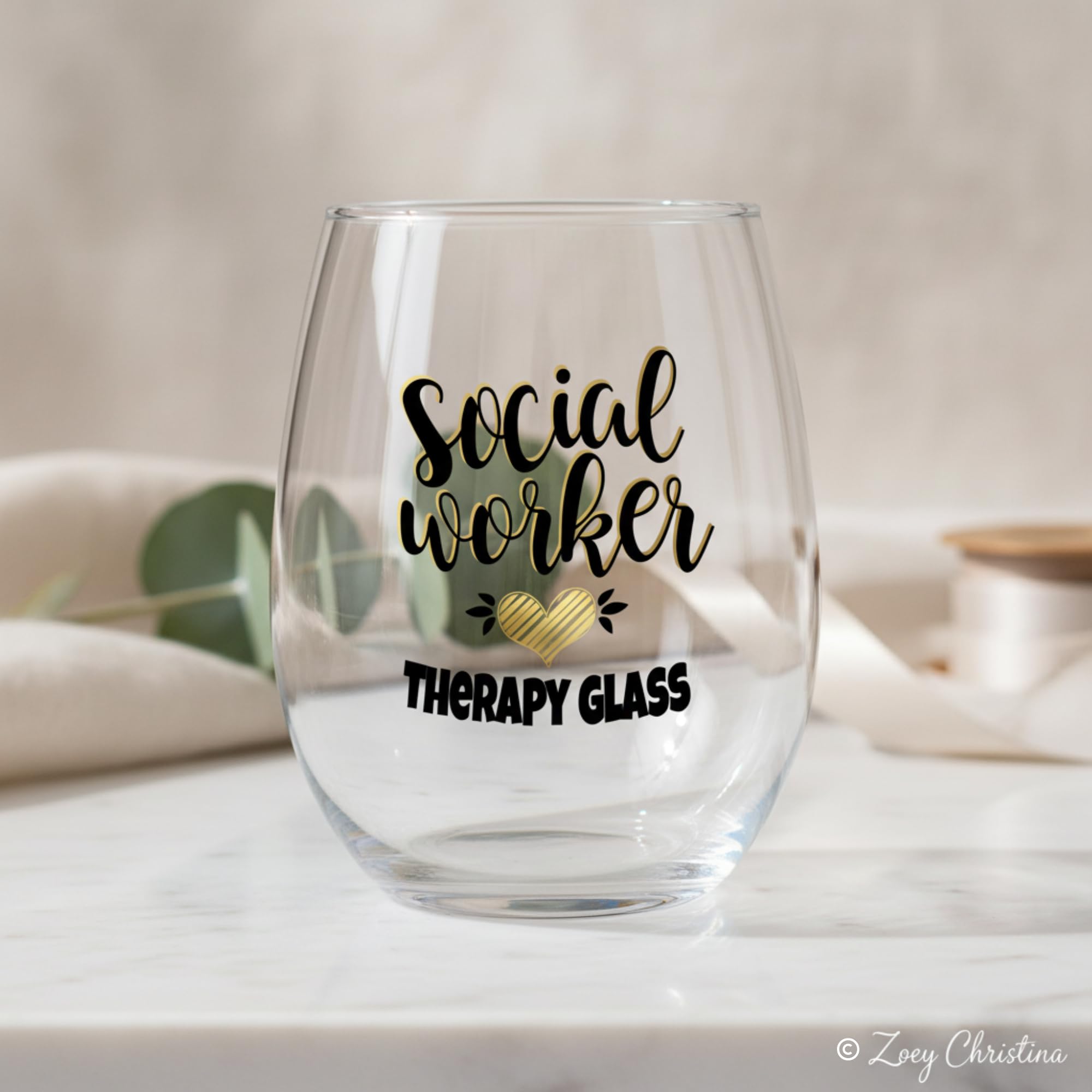 Clear glass body with bold black and gold text heart design on Zoey Christina Therapy Glass