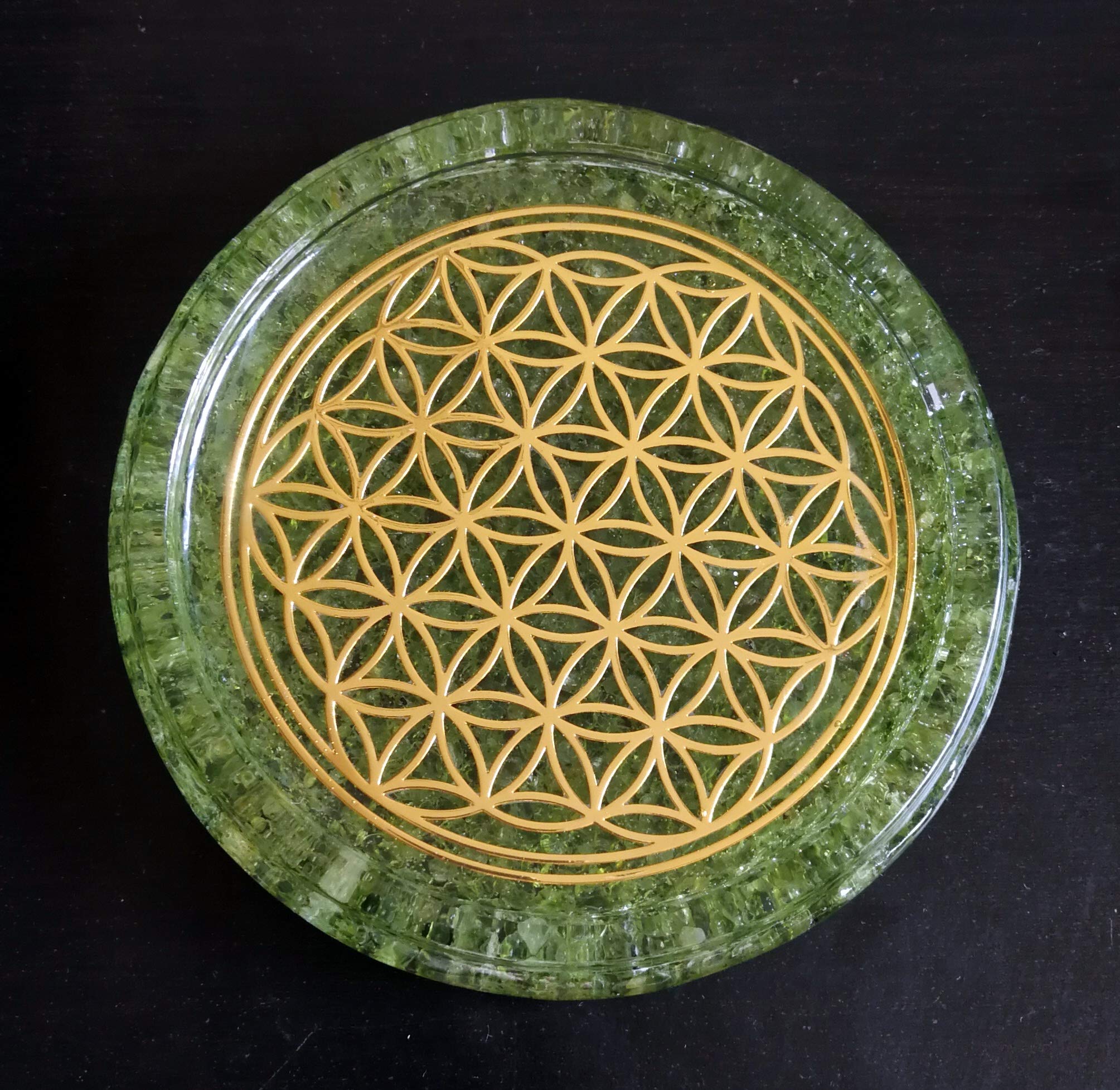 Olivine Peridot crystals with resin base on coaster