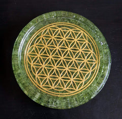 Olivine Peridot crystals with resin base on coaster