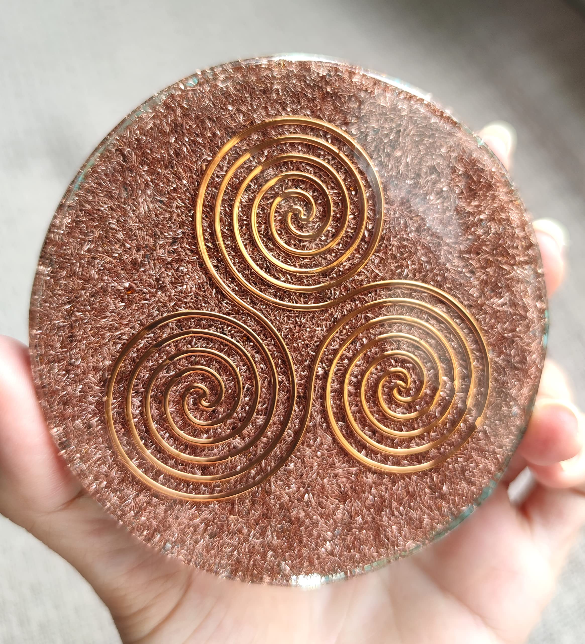 Raised edge design on coaster for cups