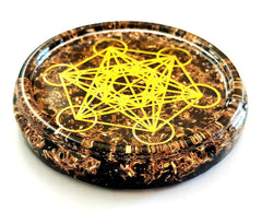 materials include obsidian crystals copper chips triskelion symbol and resin