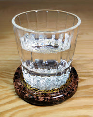 Obsidian crystals Flower of Life symbol and Triskelion on resin coaster